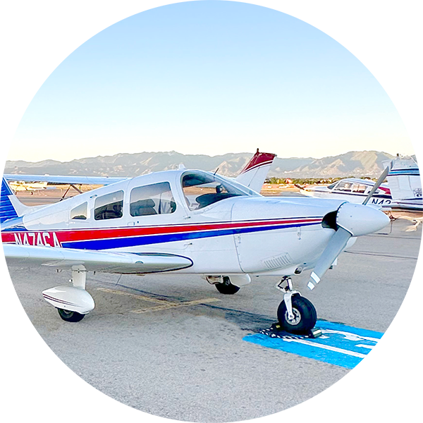 Piper airplane with blue and red stripes